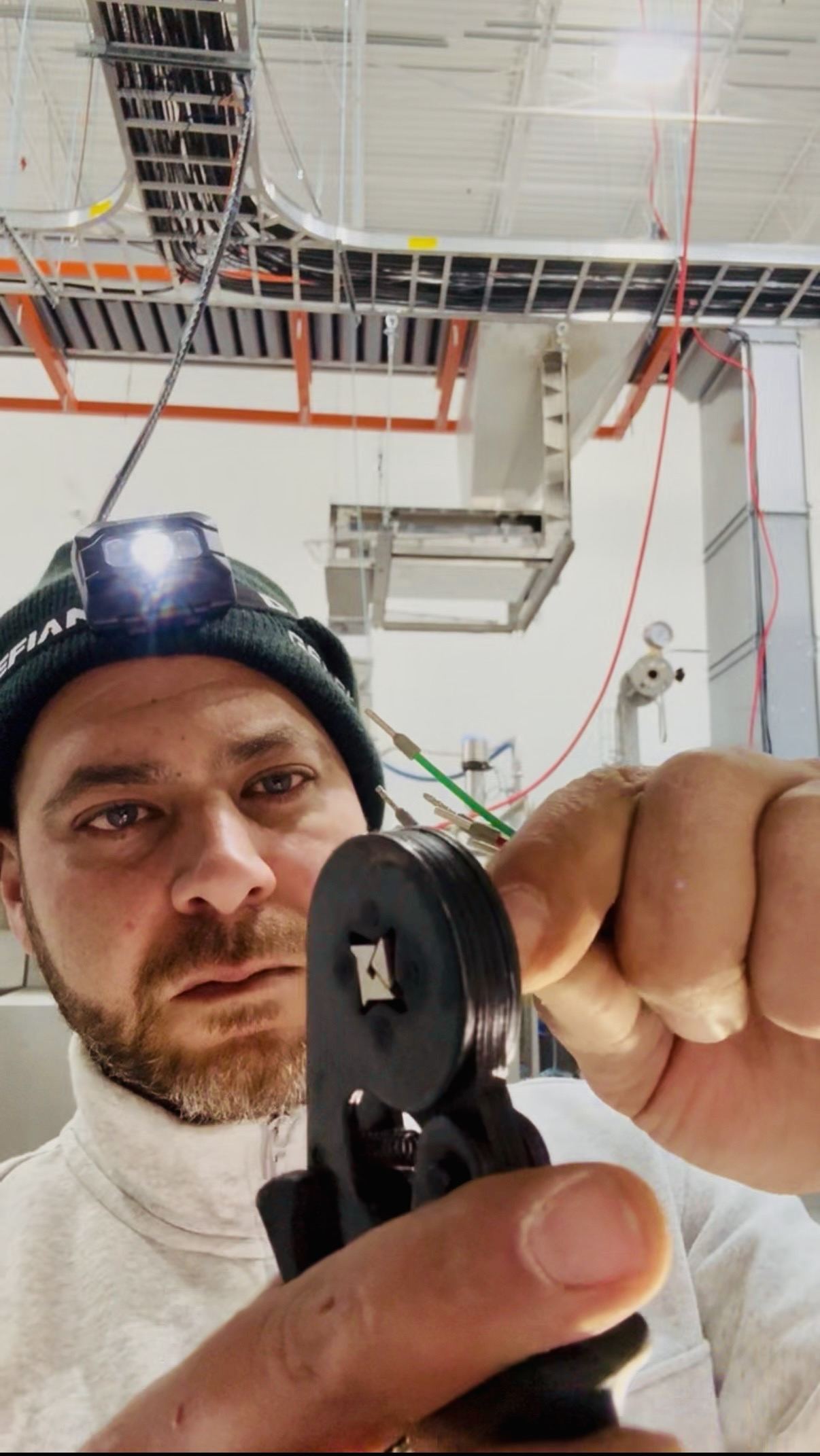 Ahmed working on a panel upgrade in Toronto